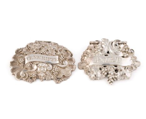 A George IV silver wine label, by Robert Garrard, London 1828, shaped oval pierced form with scroll grape and vine decoration