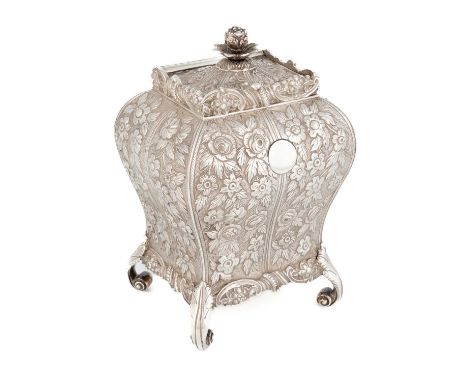A George III silver tea caddy, by Joseph Angell, London 1819, in the 18th century manner, bombé form, chased with flowers and