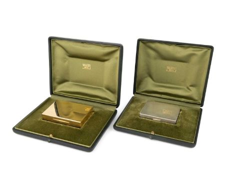 An Italian 18-carat gold box and matching silver compact,retailed by Bulgari, Roma,rectangular form, the interior of the hing
