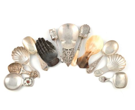 A collection of caddy spoons,comprising silver examples: a modern one with an enamelled Tudor rose motif, Birmingham 1977, on