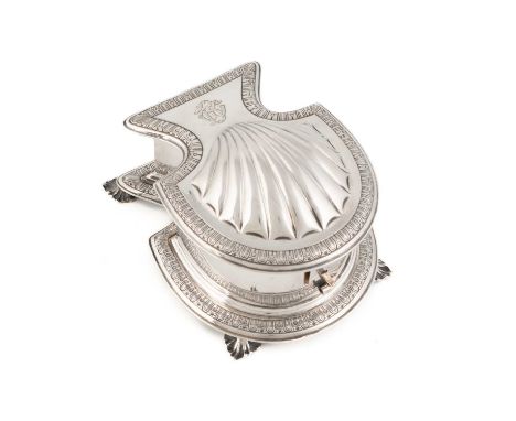 An Edwardian silver shell inkstand,by Carrington &amp; Co, London 1909,shell-shape form with an engraved decorative border, t