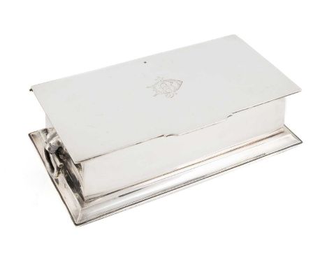 A silver inkstand,by Hukin &amp; Heath Ltd, London 1915,rectangular form with lion mask ring handles, the cover engraved with