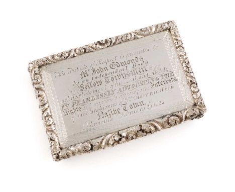 A George IV silver presentation snuff box, by Thomas Shaw, Birmingham 1824, rectangular form with scroll foliate borders and 