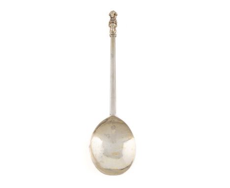 An early-17th century silver Buddha knop spoon,  marked once in the bowl with a five-pellet mark, probably West Country, gild