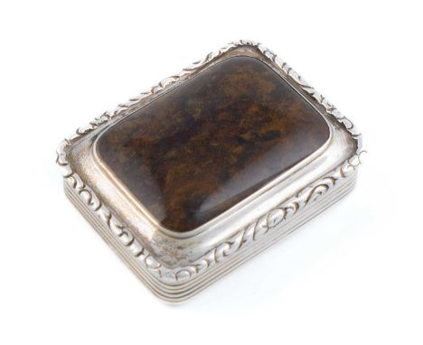 A George IV silver and agate snuff box,no apparent maker's mark, London 1828,rounded rectangular form, foliate border, reeded