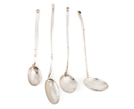 By Michael Allen Bolton, a modern silver ladle,London 2001,spot-hammered decoration, set with a green agate to the terminal, 
