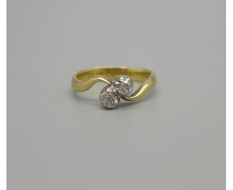 A Victorian 22ct gold two-diamond crossover ring, London 1870, 3.3g, J 