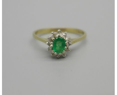 A 9ct gold, emerald and diamond cluster ring, 1.7g, O 