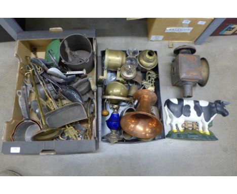 A collection of metalware including brass and copper, an oil lamp and shade, metal pierced dish, copper photograph frame, hor