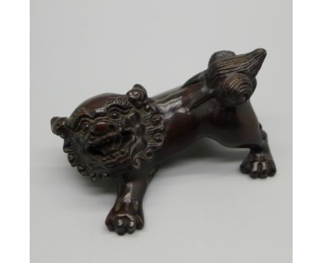 A Foo dog Netsuke, signed 