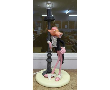 An Italian Pink Panther table lamp (lacking shade) 