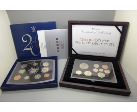 A Royal Mint UK proof coin collection 2000 and a Westminster The Queen's New Portrait Specimen Set, both cased 