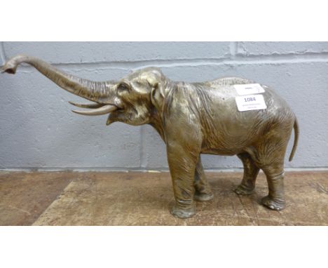 Two model elephants, other metal ware and two brushes and a mirror **PLEASE NOTE THIS LOT IS NOT ELIGIBLE FOR POSTING AND PAC