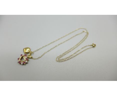 A 9ct gold, ruby and diamond pendant and chain, 1.7g 
