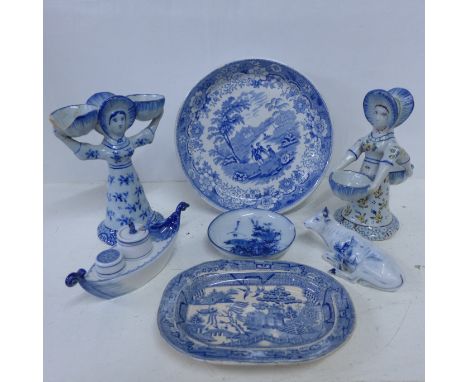 A Delft double-sided figure, marked 1792, and one other similar salt in blue and white, a/f, a comport, a Willow pattern dish