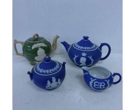 An Edward VIII Wedgwood tea service: teapot, cream and sugar, 1937, and a Queen Victoria commemorative teapot, chip on rim of