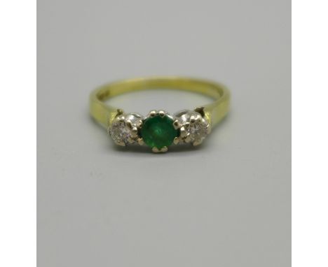 An 18ct gold, diamond and emerald ring, 2.3g, L 