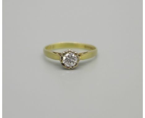 An 18ct gold and diamond solitaire ring, 2.1g, L 