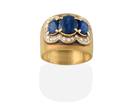 A Sapphire and Diamond Triple Cluster Ring, three graduated oval cut sapphires within a border of eight-cut diamonds, in yell