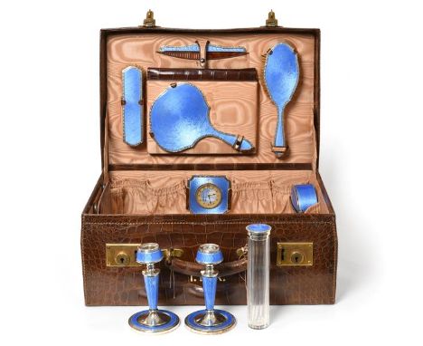 A George V Enamelled Silver Dressing-Table Service, by Henry Matthews, Birmingham, 1927, each piece with blue guilloche ename