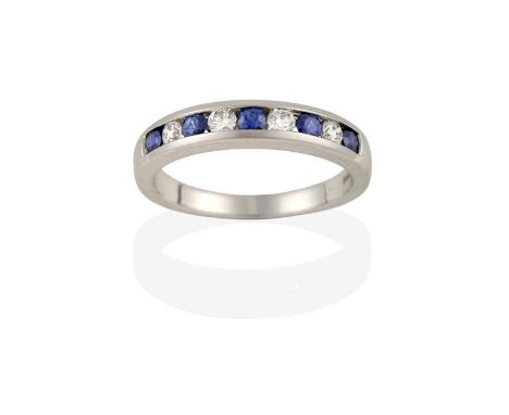 An 18 Carat White Gold Sapphire and Diamond Half Hoop Ring, four round brilliant cut diamonds alternate with five round cut s