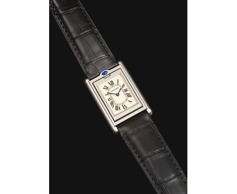 A Stainless Steel Reversible Wristwatch, signed Cartier, model: Tank Basculante, ref: 2405, circa 2000, quartz movement, silv