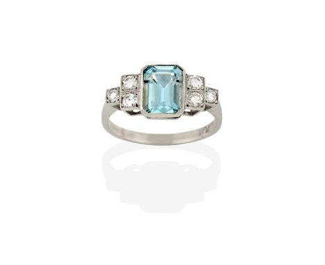 An Art Deco Style Aquamarine and Diamond Ring, the emerald-cut aquamarine to round brilliant cut diamond set stepped shoulder