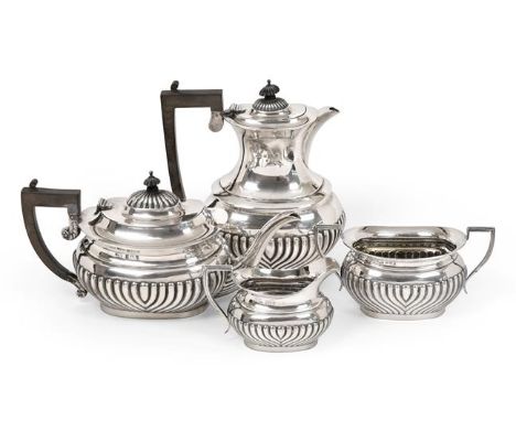 A Four-Piece Edward VII Silver Tea-Service, Probably by W. G. Keight and Co., Birmingham, 1904, each piece with fluted lower 