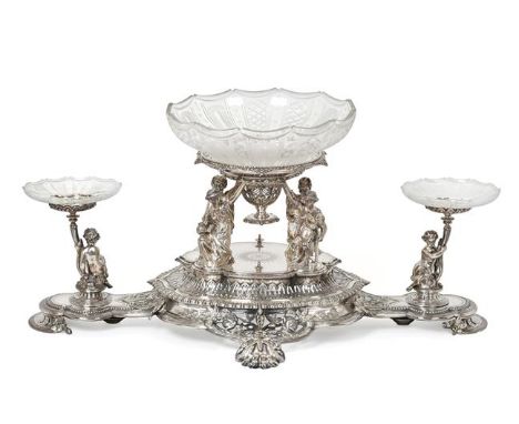 A Victorian Silver Plate Centrepiece, by Elkington and Co., Birmingham, 1875, oval, the centre with four cast female figures 