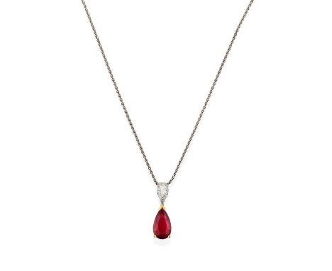 A Ruby and Diamond Pendant on Chain, a pear shaped ruby in a yellow claw setting, surmounted by a pear shaped diamond in a wh