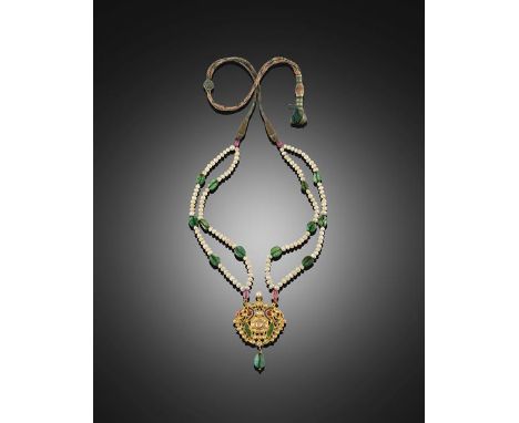 An Indian Diamond and Enamel Pendant Necklace, late 19th century, the openwork floral spray inlaid with Indian cut diamonds, 