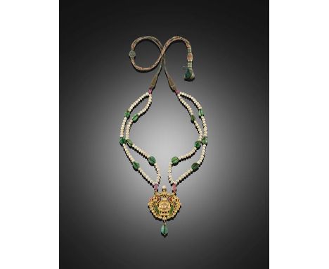 An Indian Diamond and Enamel Pendant Necklace, late 19th century, the openwork floral spray inlaid with Indian cut diamonds, 