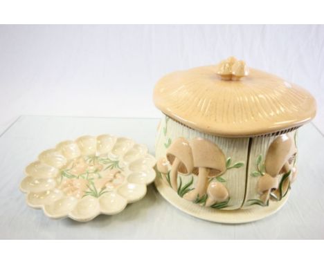 Large ceramic Mushroom pot with four sections and a similar plate