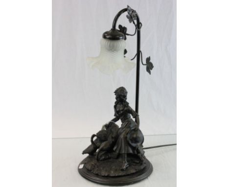 Metal based lamp featuring a Girl with Geese