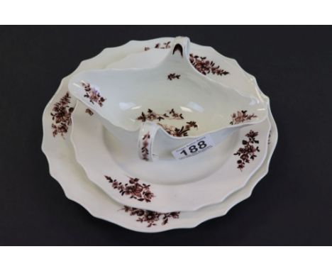 Two 18th or early 19th Century plates and a twin handled sauce boat, possibly Worcester