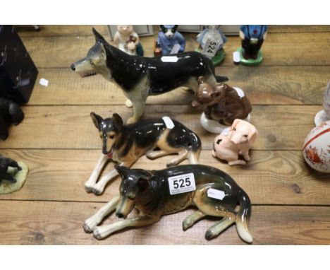 Three ceramic Alsation dog figures ,a  John Beswick pig figure and a Lomonsov bear.