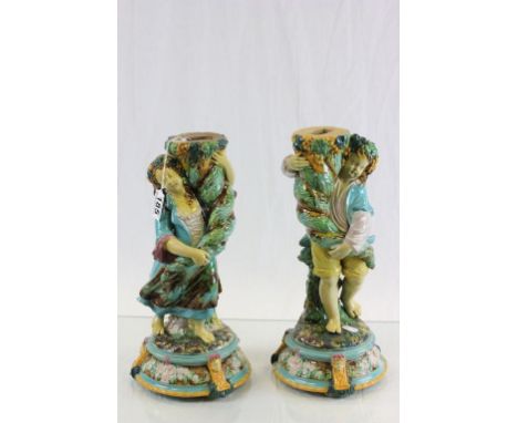 Pair of Majolica Lamp bases of a boy & girl