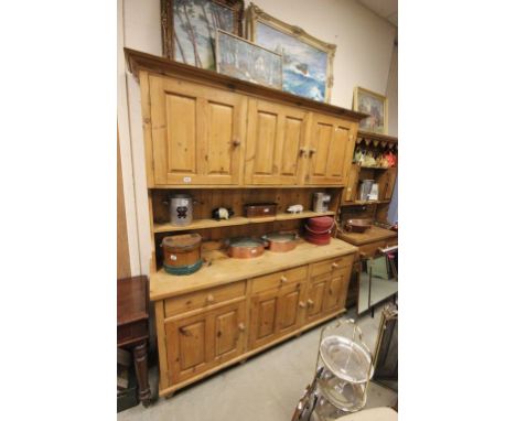 Large Rustic Pine Country Dresser, the upper structure with Three Cupboards above an Open Shelf and the base with Three Drawe