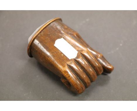 An antique treen snuff box in the form of a hand possilbly Masonic.