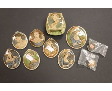 Collection of seven Wade porcelain Plaques depicting females and a similar trinket box plus two Wade Collectors Club badges