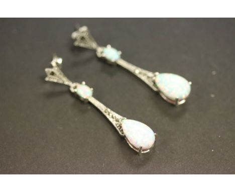 A pair of silver marcasite and opal drop earrings