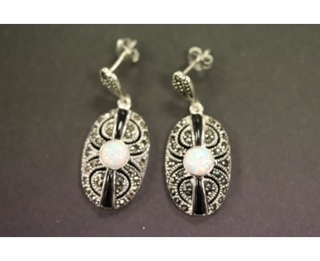 A pair of silver marcasite and onyx earrings with central opal panel