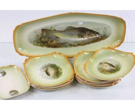 Set of Eleven Early 20th century German Ceramic Plates decorated with Fish together with Fish Serving Plate and a Saucer