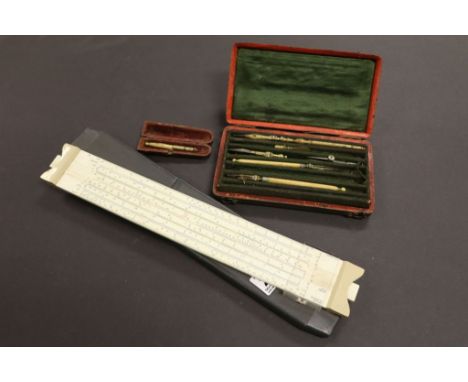 Cased vintage technical drawing set, a cased slide rule & a cheroot case with another drawing tool in it