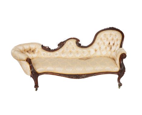 JAMES WINTER AND SON; A VICTORIAN CARVED WALNUT SHOW FRAME SOFA205cm wide; 89cm high