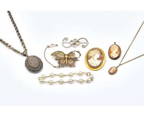 A GROUP OF JEWELLERY (9)Comprising; a gold mounted oval shell cameo brooch, carved as the portrait of a lady, detailed 9 CT, 