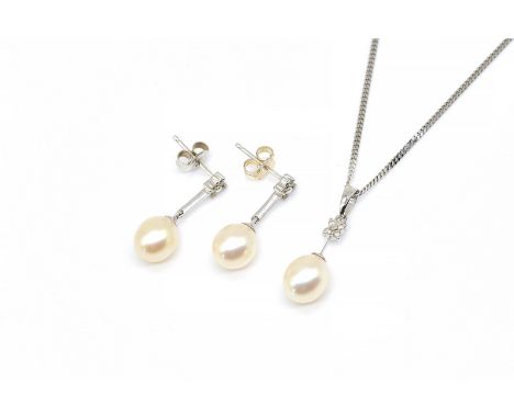 A PAIR OF CULTURED PEARL AND DIAMOND EARRINGS AND A MATCHING PENDANT NECKLACE (2)The 9ct white gold earrings, with circular c