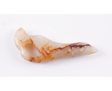 A CHINESE ARCHAISTIC JADE PLECTRUMThe stone of light greyish brown tone with russet and cream inclusions, 9cm lengthGood cond