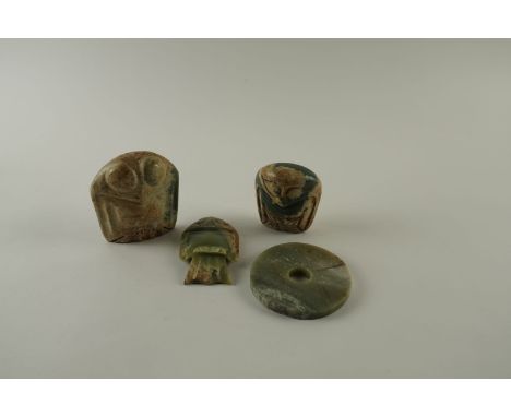 THREE CHINESE ARCHAISTIC JADE CARVINGS OF BIRDS AND A JADE BI DISC (4)Of various forms, each of green tone with cream and lig