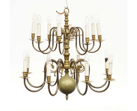 A DUTCH BRASS SIXTEEN LIGHT CHANDELIER20th Century
With ball knop finial, tiered scroll arms, chain and ceiling socle, 69cm h